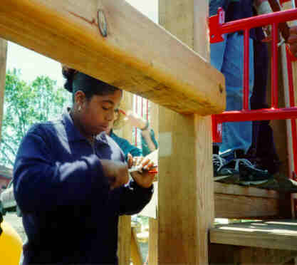 GirlWorkingOnStructure.JPG (14886 bytes)